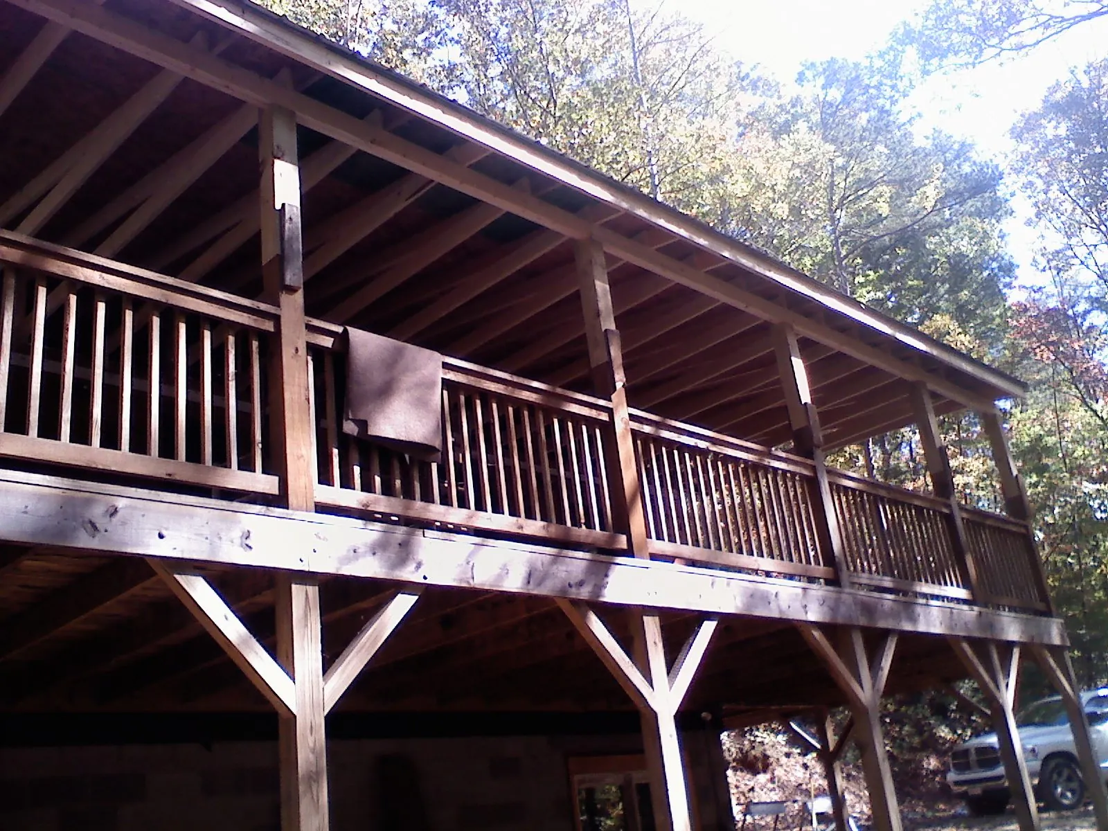 Timber framing under a new elevated porch and deck — Roof Leak Repair in Modale by Roofing Brothers